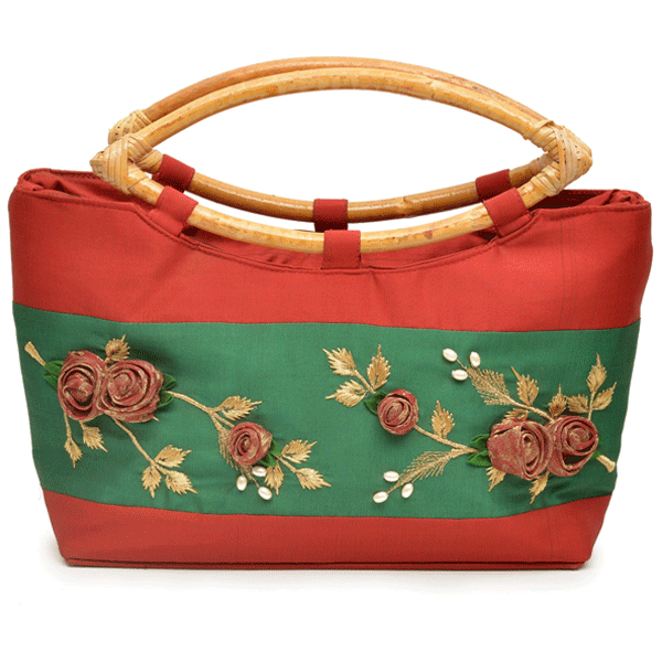 Neha's bags - A simple yet elegant bag can never go out of style. Grab this  crimson silk bag which can be paired with sarees, dresses or even your  indo-western outfits. http://www.nehasbags.com/silk-leather-bags-4952.html #